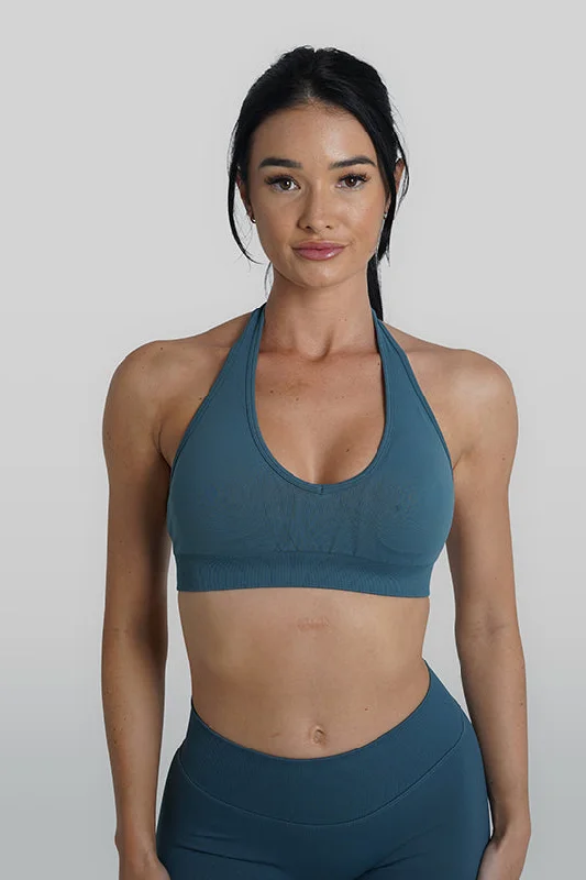 Sports top with braid trim -RECOIL HALTER CROP - BLUE TEAL