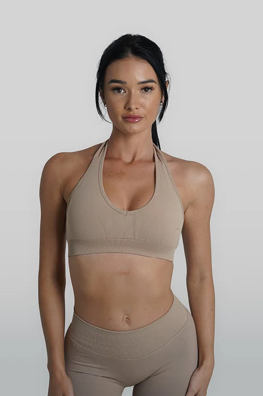 Sports top with sheer neck -RECOIL HALTER CROP - LATTE