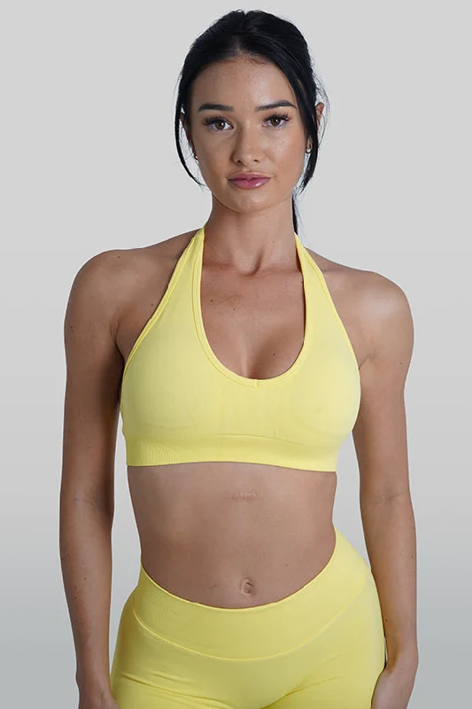 Sports top with thick neck -RECOIL HALTER CROP - YELLOW